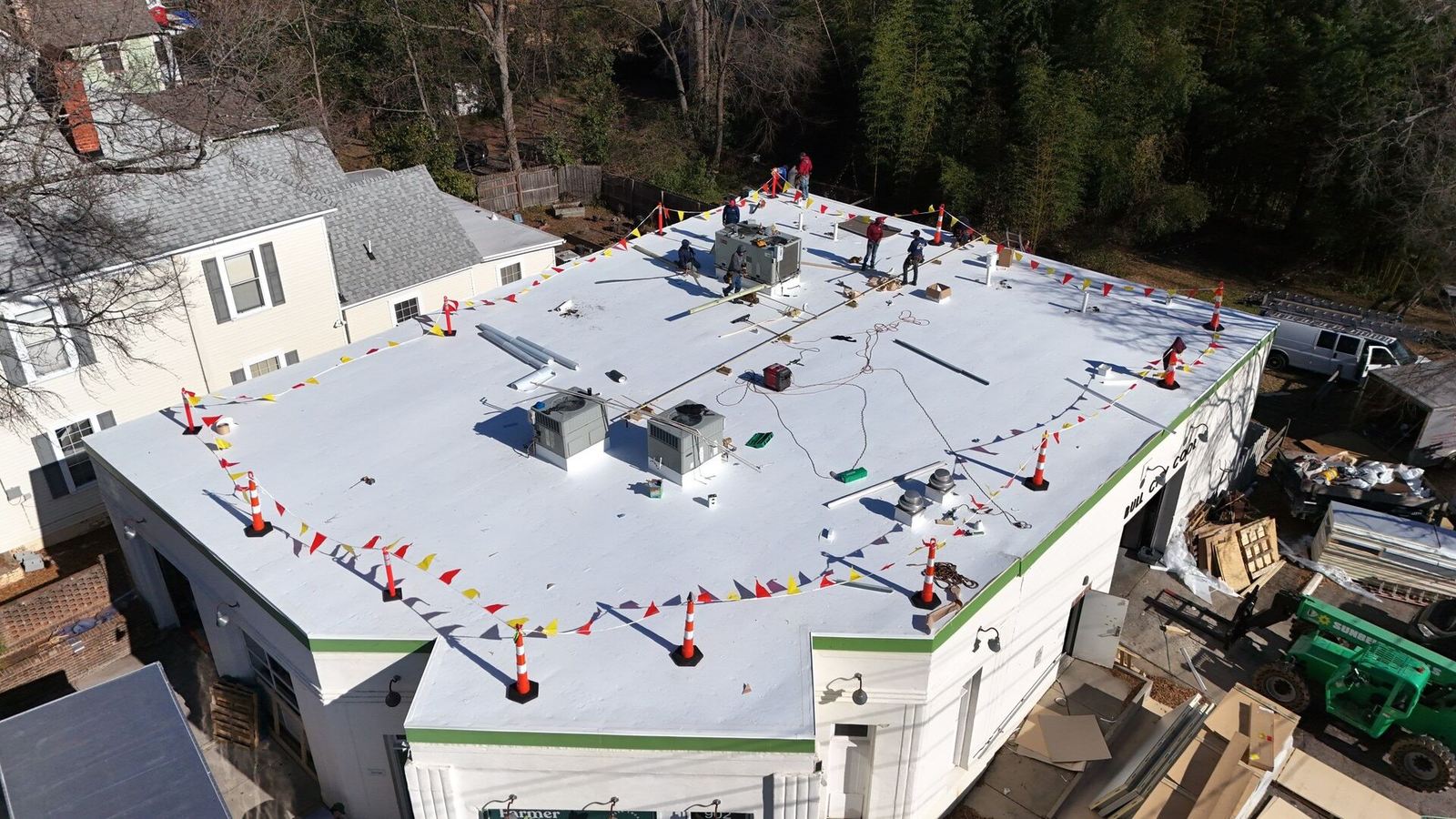 Drone view of a finished white TPO flat roof