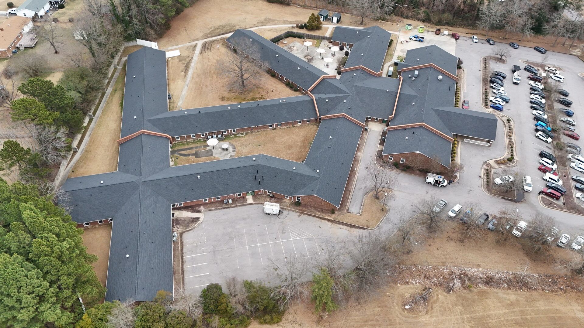 Commercial shingle roof by K&D Roofing