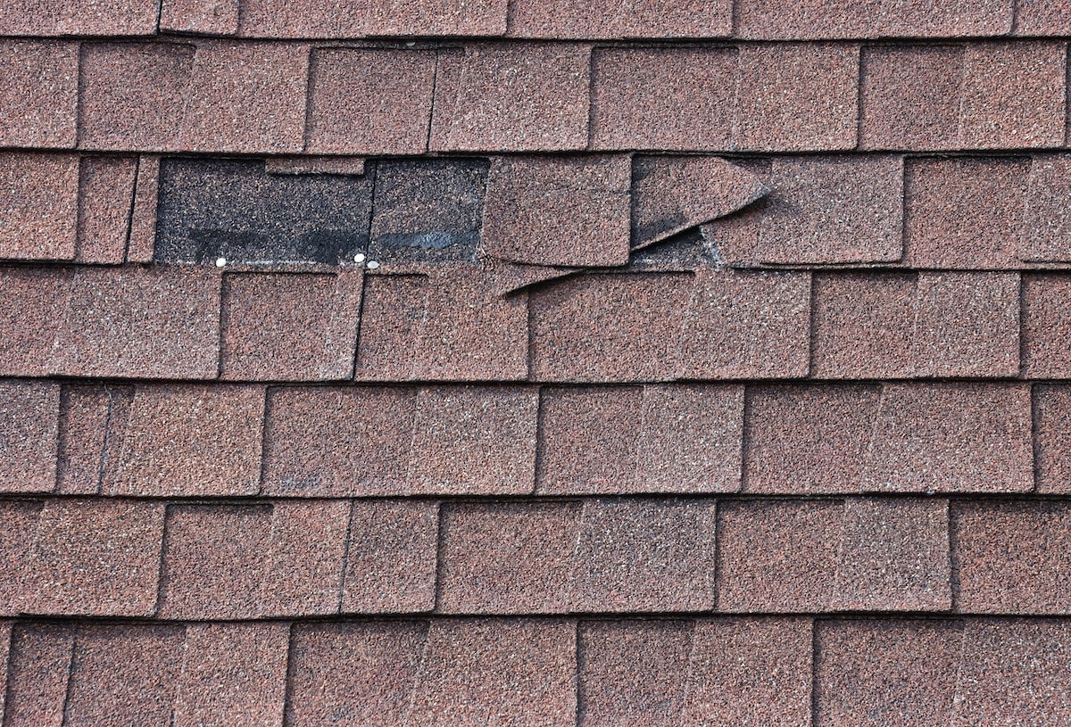 Two Shingles Missing from Mansard Roof missing shingles