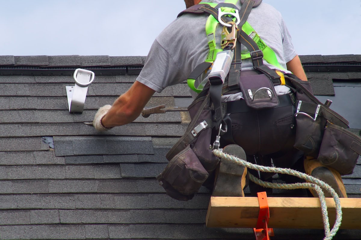 roof repair cost roofer construction roof maintenance rope security worker