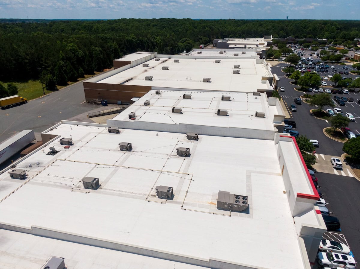 epdm vs tpo Drone Images of Commercial Roofs Featuring TPO and Asphalt Shingles: Midday, Sunny, No People